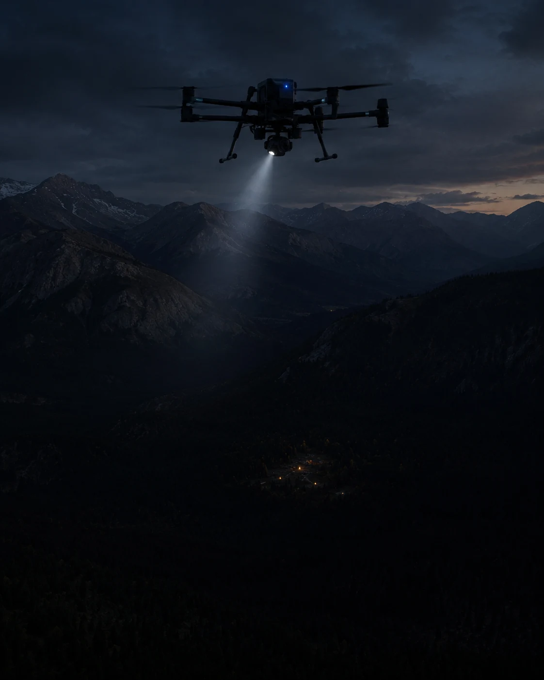 Drone with a downward beam over forested mountains at dusk, distant pinpoint lights